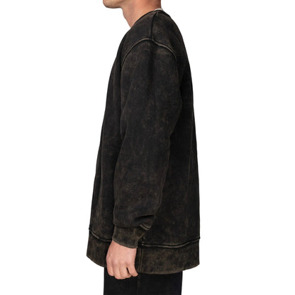 Person wearing a dark brown distressed jacket on a gray background